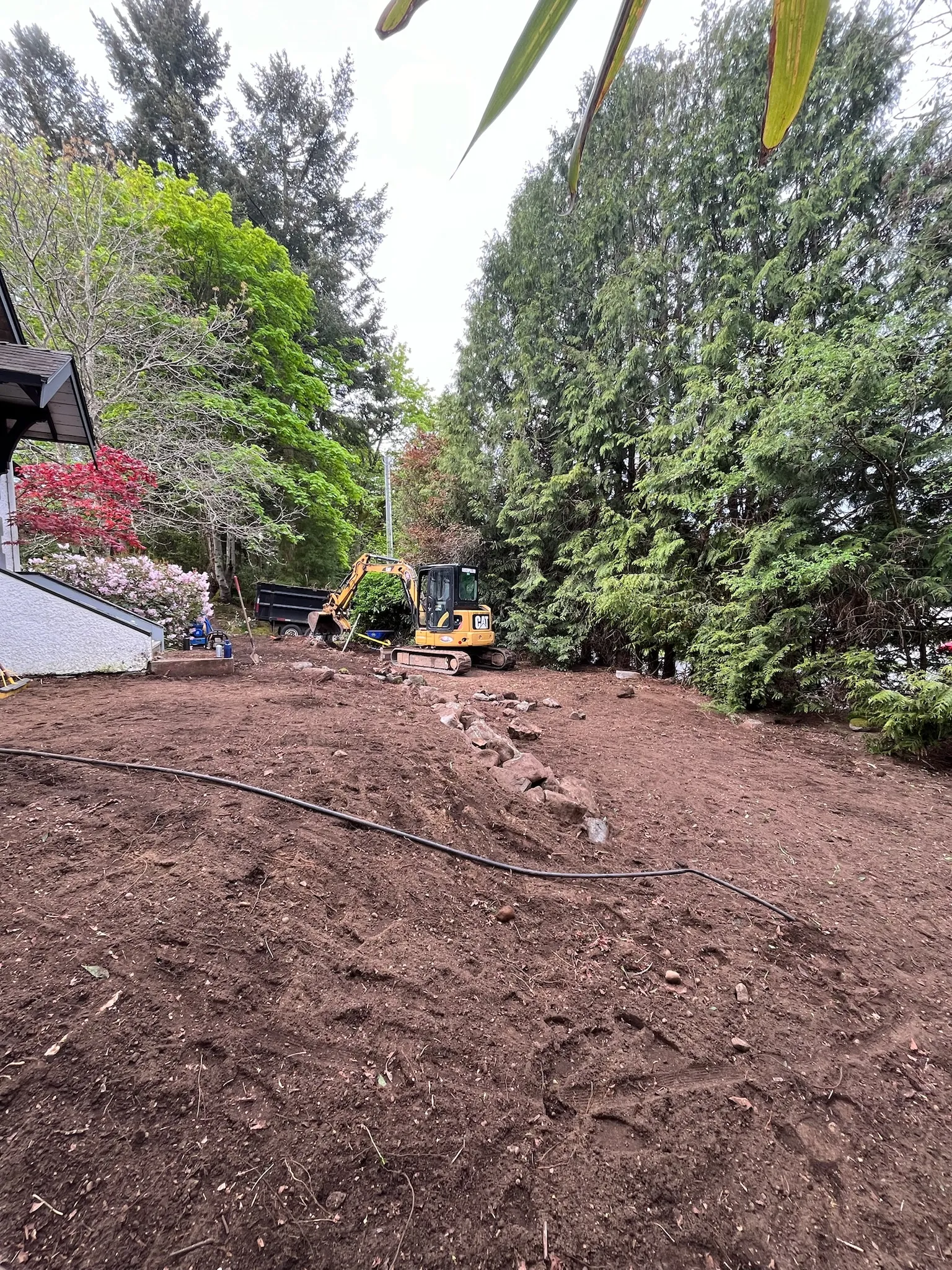 Cleared and excavated, with the grade set for the new layout.