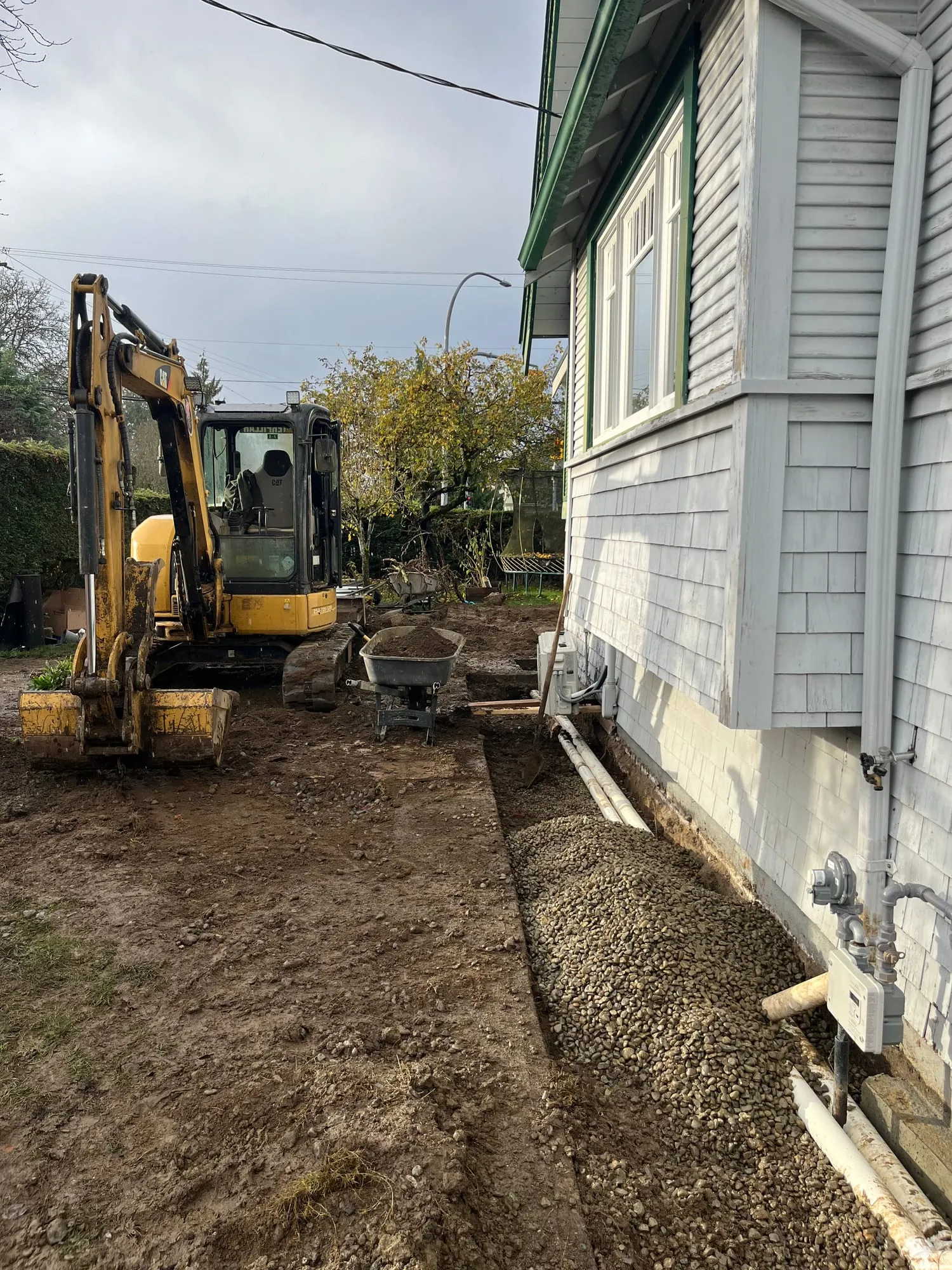 Trench opened and graded along the footings.
